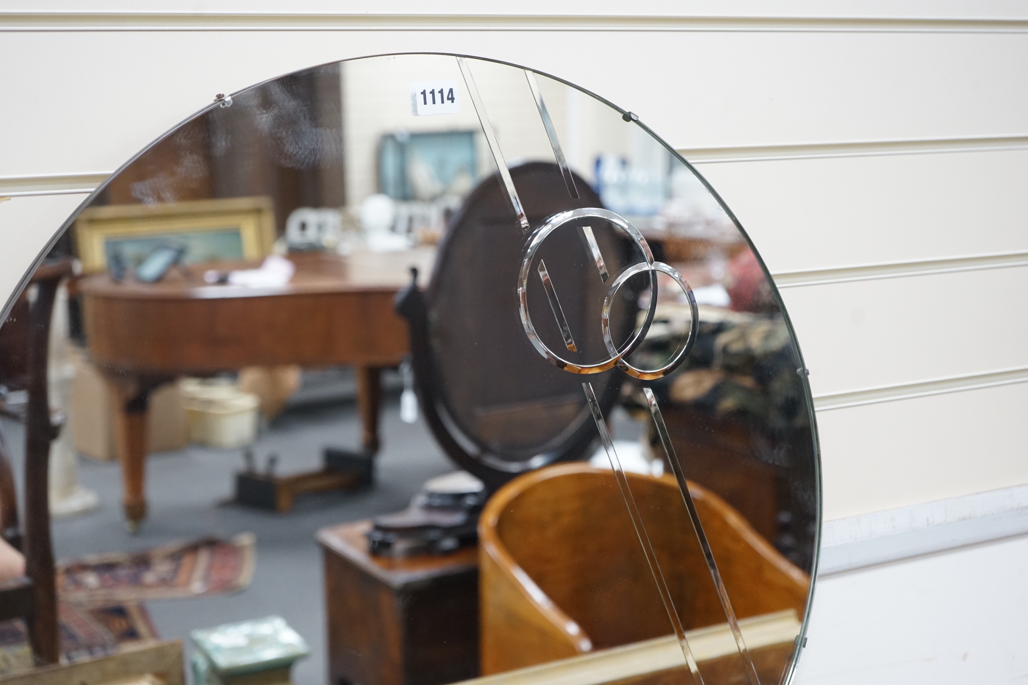 A circular Art Deco wall mirror, 66cm diameter